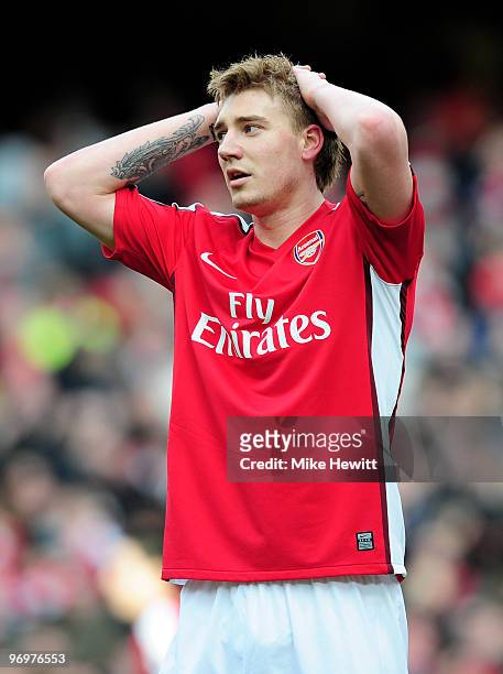 Nicklas Bendtner of Arsenal reacts after hitting the bar during the Barclays Premier League match between Arsenal and Sunderland at Emirates Stadium...