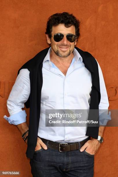 Singer Patrick Bruel attends the 2018 French Open - Day Thirteen at Roland Garros on June 8, 2018 in Paris, France.