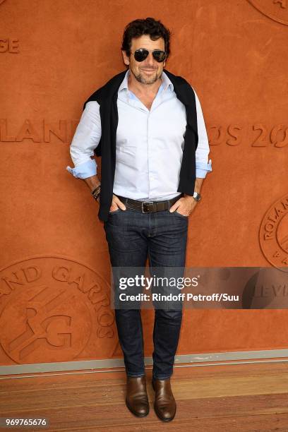 Singer Patrick Bruel attends the 2018 French Open - Day Thirteen at Roland Garros on June 8, 2018 in Paris, France.