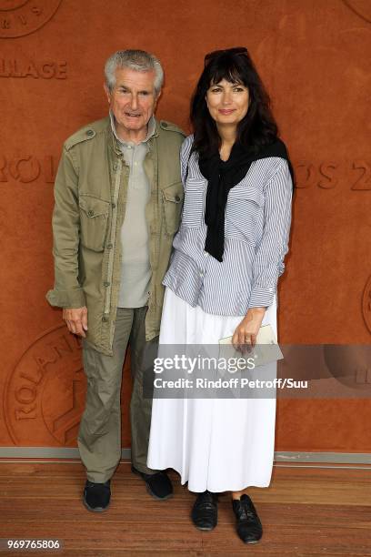 Director Claude Lelouch and his companion Valerie Perrin attends the 2018 French Open - Day Thirteen at Roland Garros on June 8, 2018 in Paris,...