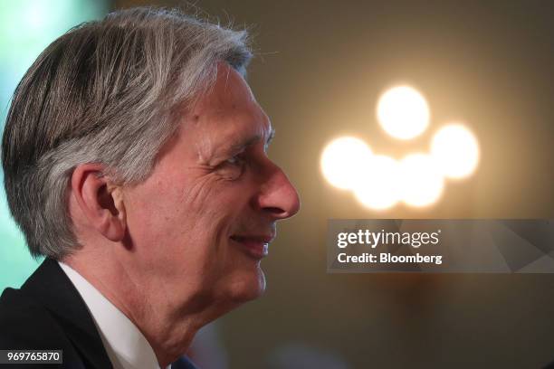 Philip Hammond, U.K. Chancellor of the exchequer, sits in the audience at the German Foundation of Family Businesses conference in Berlin, Germany,...