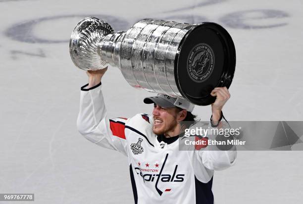 Oshie of the Washington Capitals hoists the Stanley Cup after the team's 4-3 win over the Vegas Golden Knights in Game Five of the 2018 NHL Stanley...