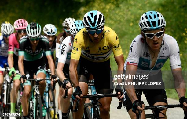 Italy's Gianni Moscon , wearing the overall leader's yellow jersey rides with his Great Britain's Team Sky cycling team partners, in the last ascent...