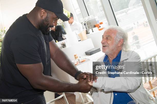 World Judo Champion Teddy Riner and actor Jean Paul Belmondo attend the 2018 French Open - Day Thirteen at Roland Garros on June 8, 2018 in Paris,...