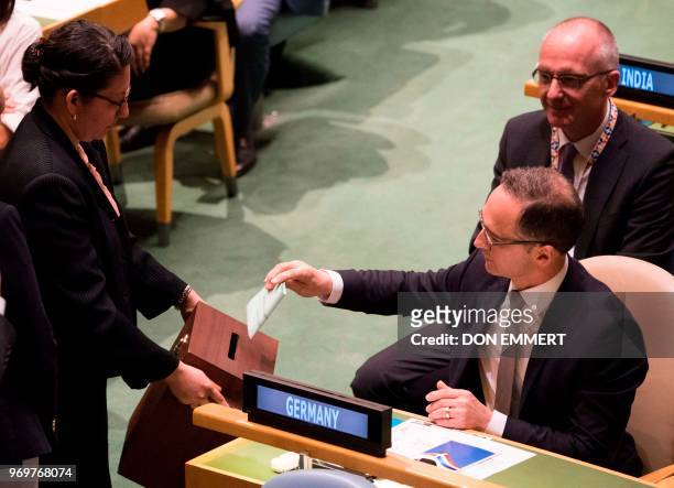 German Foreign Minister Heiko Maas votes during a General Assembly meeting to elect the five non-permanent members of the Security Council June 8 at...