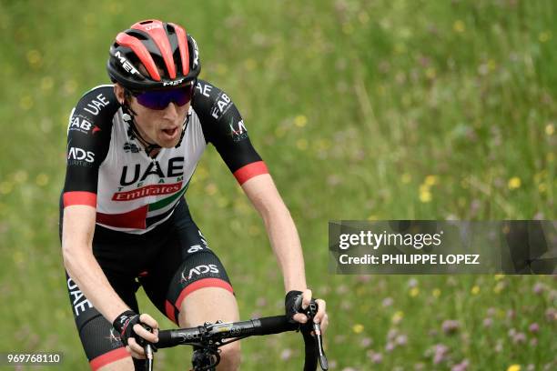 Ireland's Daniel Martin rides ahead in the last ascent to Valmorel on his way to win the fifth stage of the 70th edition of the Criterium du Dauphine...