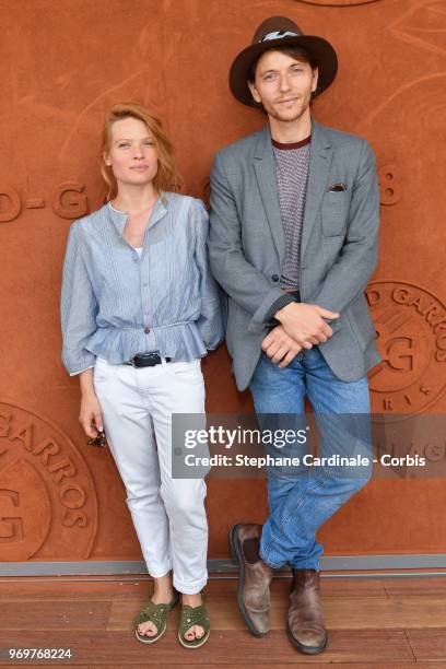 Melanie Thierry and Raphael attend the 2018 French Open - Day Thirteen at Roland Garros on June 8, 2018 in Paris, France.