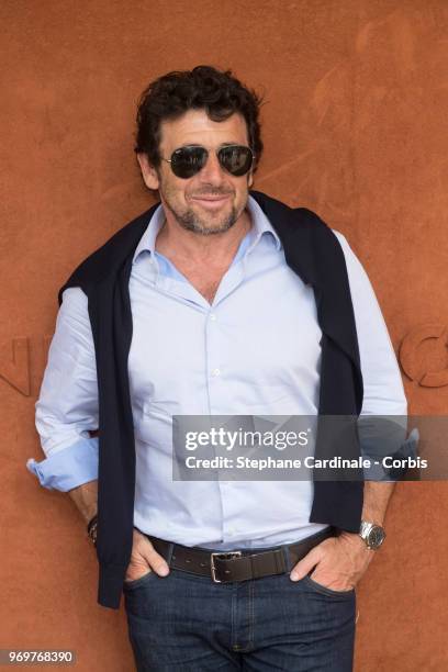 Patrick Bruel attends the 2018 French Open - Day Thirteen at Roland Garros on June 8, 2018 in Paris, France.