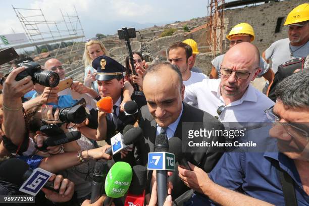 The Italian Minister of Cultural Heritage, Alberto Bonisoli, with journalists, in one of the new excavations that are part of the Regio V site of the...