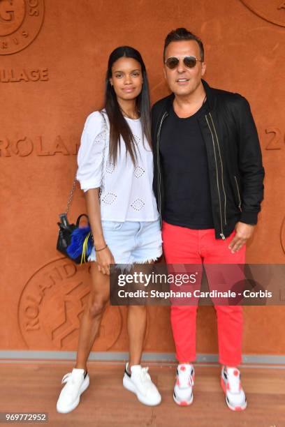 Jean-Roch and his wife Anais Pedri Monory attend the 2018 French Open - Day Thirteen at Roland Garros on June 8, 2018 in Paris, France.