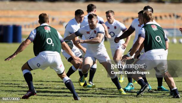 Elliot Daly breaks with the ball during the England training session held at St. Stithians College on June 8, 2018 in Sandton, South Africa.