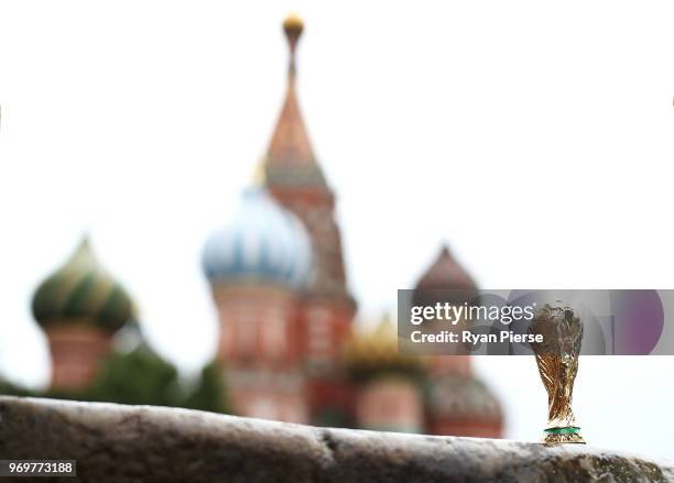 In this photo illustration, a replica FIFA World Cup is seen in front of St Basil's Cathedral ahead of the 2018 FIFA World Cup on June 8, 2018 in...