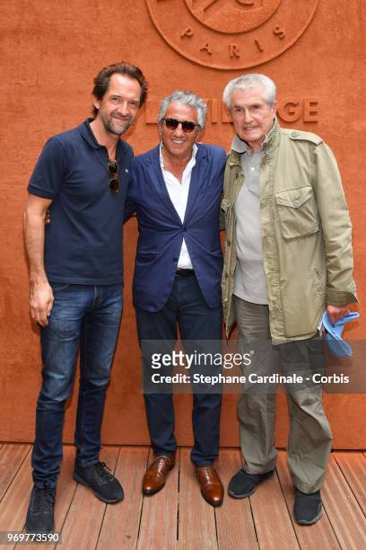 Anctors Stephane De Groodt, Richard Anconina and Director Claude Lelouch attends the 2018 French Open - Day Thirteen at Roland Garros on June 8, 2018...