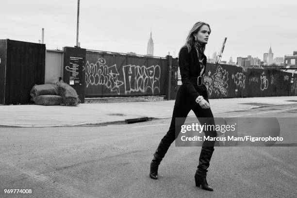 Model Anna Mila Guyenz poses at a fashion shoot for Madame Figaro on November 1, 2017 in Paris, France. Blouse by Suncoo, pantal and jacket by IKKS....