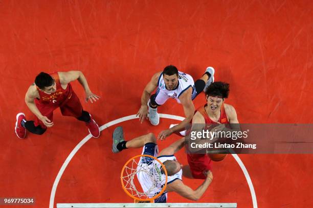 Jesse Wagstaff of Australian drives to the basket against Fu Hao of China during the 2018 Sino-Australian Men's Internationl Basketball Challenge...