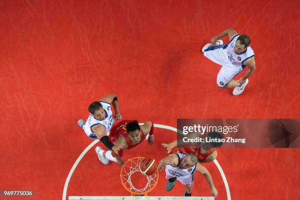 Jesse Wagstaff of Australian drives to the basket against Zhao Tailong of China during the 2018 Sino-Australian Men's Internationl Basketball...