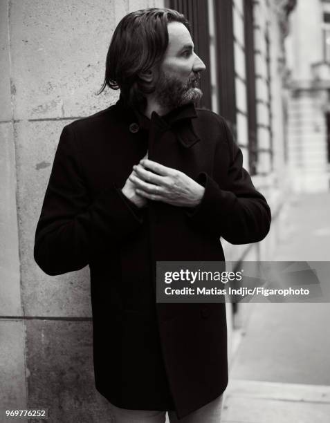 Writer Frederic Beigbeder is photographed for Madame Figaro on December 5, 2017 in Paris, France. Coat and sweater by Dior Homme. PUBLISHED IMAGE....