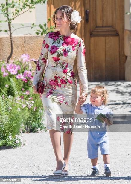Princess Sofia of Sweden and Prince Alexander of Sweden attend the christening of Princess Adrienne of Sweden at Drottningholm Palace Chapel on June...