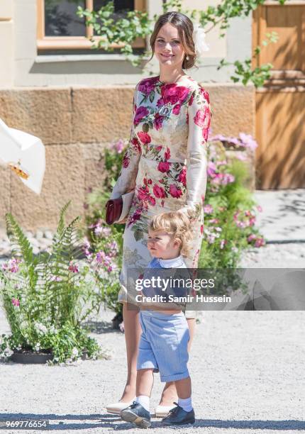 Princess Sofia of Sweden and Prince Alexander of Sweden attend the christening of Princess Adrienne of Sweden at Drottningholm Palace Chapel on June...