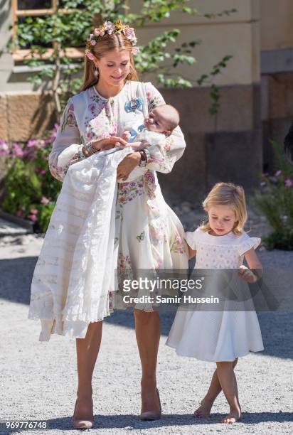 Princess Madeleine of Sweden, Princess Adrienne of Sweden and Princess Leonore of Sweden attend the christening of Princess Adrienne of Sweden at...