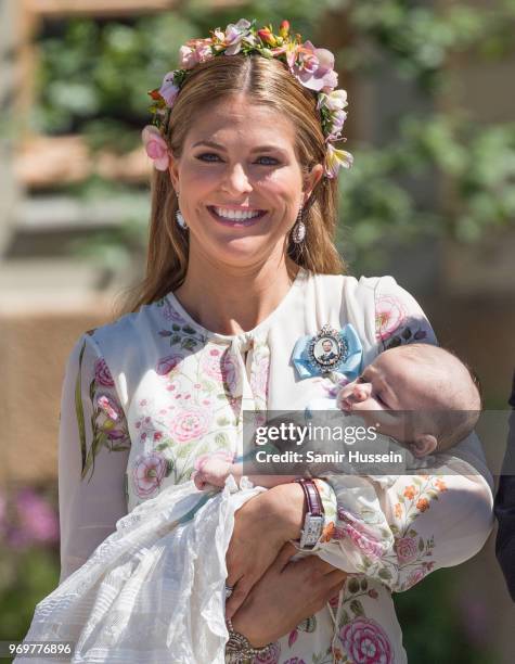 Princess Madeleine of Sweden and Princess Adrienne of Sweden attend the christening of Princess Adrienne of Sweden at Drottningholm Palace Chapel on...