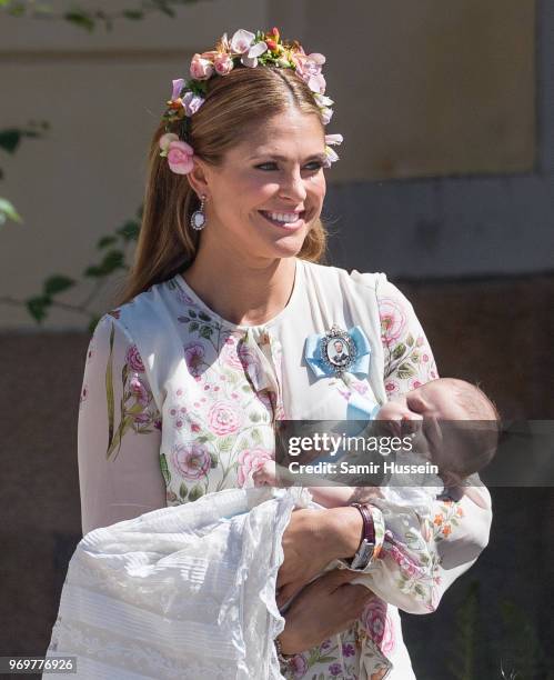 Princess Madeleine of Sweden and Princess Adrienne of Sweden attend the christening of Princess Adrienne of Sweden at Drottningholm Palace Chapel on...