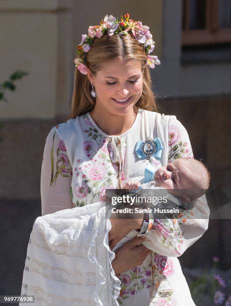 Princess Madeleine of Sweden and Princess Adrienne of Sweden attend the christening of Princess Adrienne of Sweden at Drottningholm Palace Chapel on...