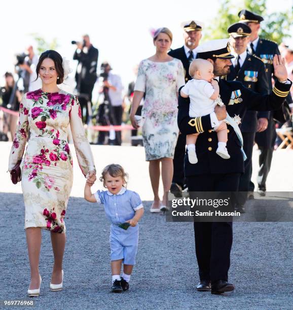 Princess Sofia of Sweden,Prince Alexander of Sweden and Prince Carl Phillip of Sweden holding Prince Gabriel of Sweden attend the christening of...