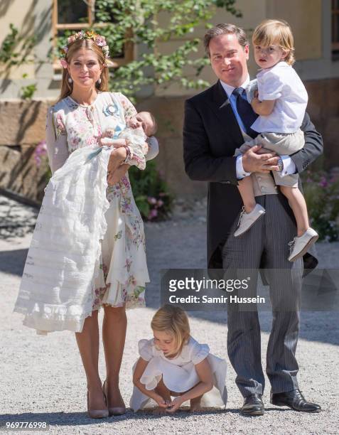 Princess Madeleine of Sweden, holding Princess Adrienne of Sweden, Princess Eleonore of Sweden and Christopher O'Neill holding Prince Nicolas of...