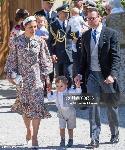 Crown Princess Victoria of Sweden, Prince Oscar of Sweden and Prince Daniel of Sweden attend the christening of Princess Adrienne of Sweden at...