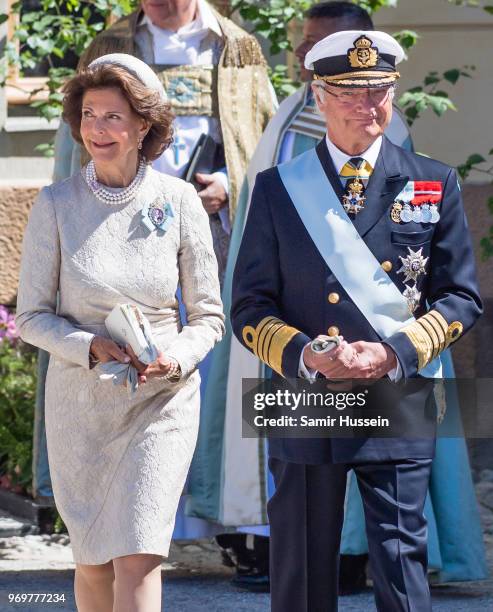 Queen Silvia of Sweden and King Carl XVI Gustaf of Sweden attend the christening of Princess Adrienne of Sweden at Drottningholm Palace Chapel on...