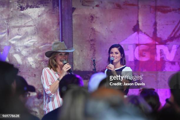 S Suzanne Alexander and recording artist Cassadee Pope speak onstage in the HGTV Lodge at CMA Music Fest on June 8, 2018 in Nashville, Tennessee.