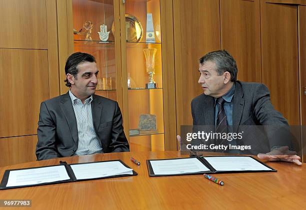 Ralf Minge and general secretary of the DFB Wolfgang Niersbach talk during a photocall at the German Football Association on February 23, 2010 in...