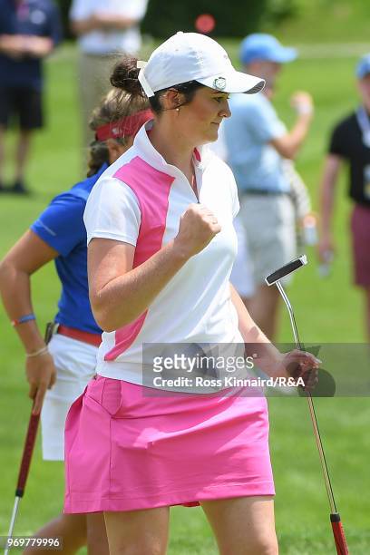 Paula Grant of Great Britian & Ireland reacts after a birdie putt on the ninth green during four-ball matches on day one of the 2018 Curtis Cup at...