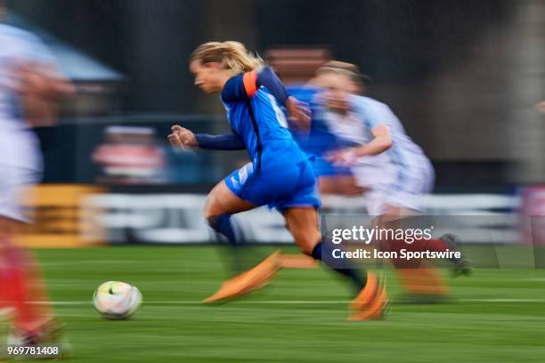 France midfielder Maeva Clemaron dribbles the ball during the SheBelieves Cup match between England and France on March 01, 2018 at Mapfre Stadium in...