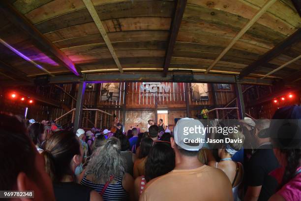 S Suzanne Alexander and recording artist Kip Moore speak onstage in the HGTV Lodge at CMA Music Fest on June 8, 2018 in Nashville, Tennessee.