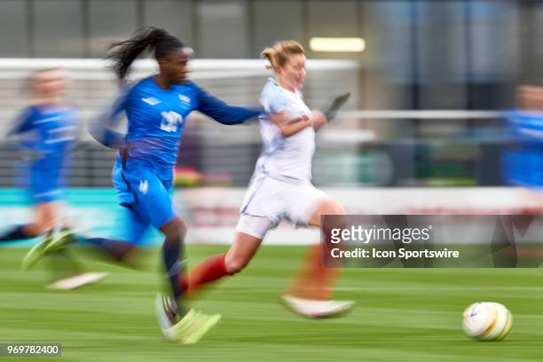 England forward Ellen White dribbles the ball past France midfielder Aminata Diallo during the SheBelieves Cup match between England and France on...