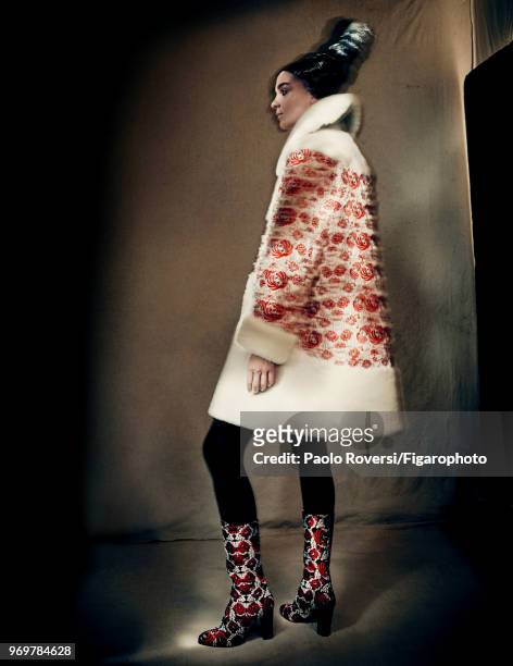 Model Mariacarla Boscono poses at a fashion shoot for Madame Figaro on October 13, 2017 in Paris, France. Clothing and boots by Azzedine Alaia...