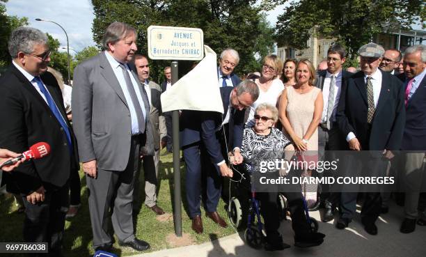 Former French First Lady Bernadette Chirac on a wheelchair accompanied by her daughter Claude Chirac and mayor of Brive-la-Gaillarde Frederic Soulier...