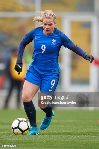 France forward Eugenie Le Sommer dribbles the ball during the first half of the SheBelieves Cup match between England and France on March 01, 2018 at...