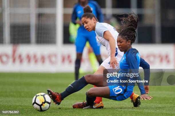France midfielder Aminata Diallo battles with England defender Demi Stokes for the ball during the SheBelieves Cup match between England and France...