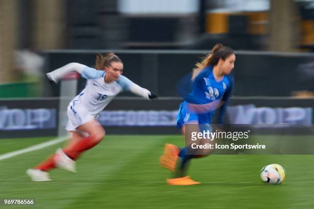 France defender Sakina Karchaoui battles with England forward Mel Lawley during the SheBelieves Cup match between England and France on March 01,...
