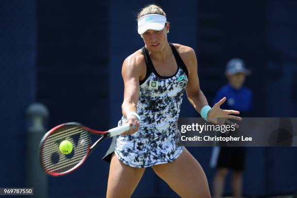 Yanina Wickmayer of Belgium in action against Harriet Dart of Great Britain during their Quarter Final match on Day 7 of the Fuzion 100 Surbition...