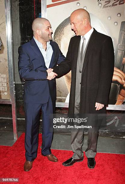 Actors Guillermo Diaz and Bruce Willis attend the premiere of "Cop Out" at AMC Loews Lincoln Square 13 on February 22, 2010 in New York City.