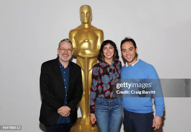 Morgan Neville, Caryn Capotosto and Nicholas Ma attend an official screening of "Won't You Be My Neighbor?" hosted by the Academy Of Motion Picture...