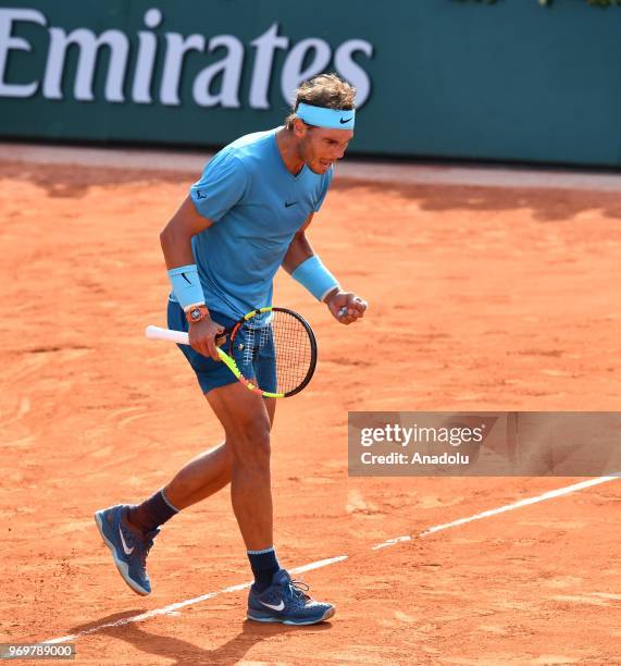 Rafael Nadal of Spain celebrates his victory against Juan Martin del Potro of Argentina during their semifinal match at the French Open tennis...