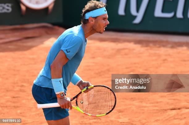 Rafael Nadal of Spain celebrates his victory against Juan Martin del Potro of Argentina during their semifinal match at the French Open tennis...