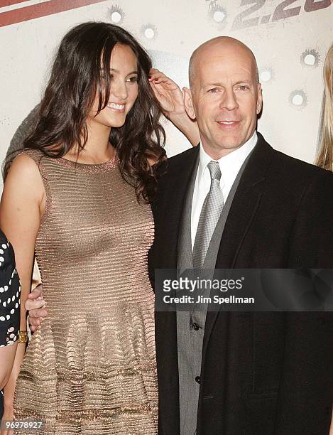Emma Heming and Actor Bruce Willis attend the premiere of "Cop Out" at AMC Loews Lincoln Square 13 on February 22, 2010 in New York City.