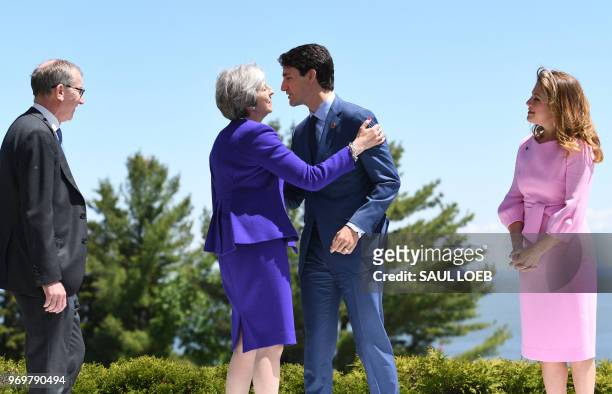 Prime Minister of Canada Justin Trudeau and his wife Sophie Gregoire Trudeau greet British Prime Minister Theresa May and her husband Philip May...