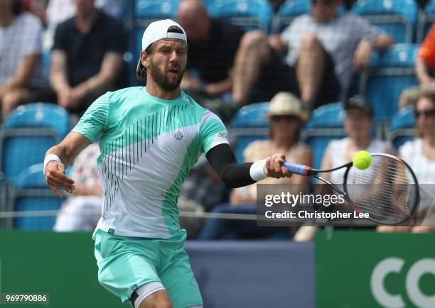 Jurgen Melzer of Austria in action against Daniel Evans of Great Britain during their Quarter Final match on Day 7 of the Fuzion 100 Surbition Trophy...